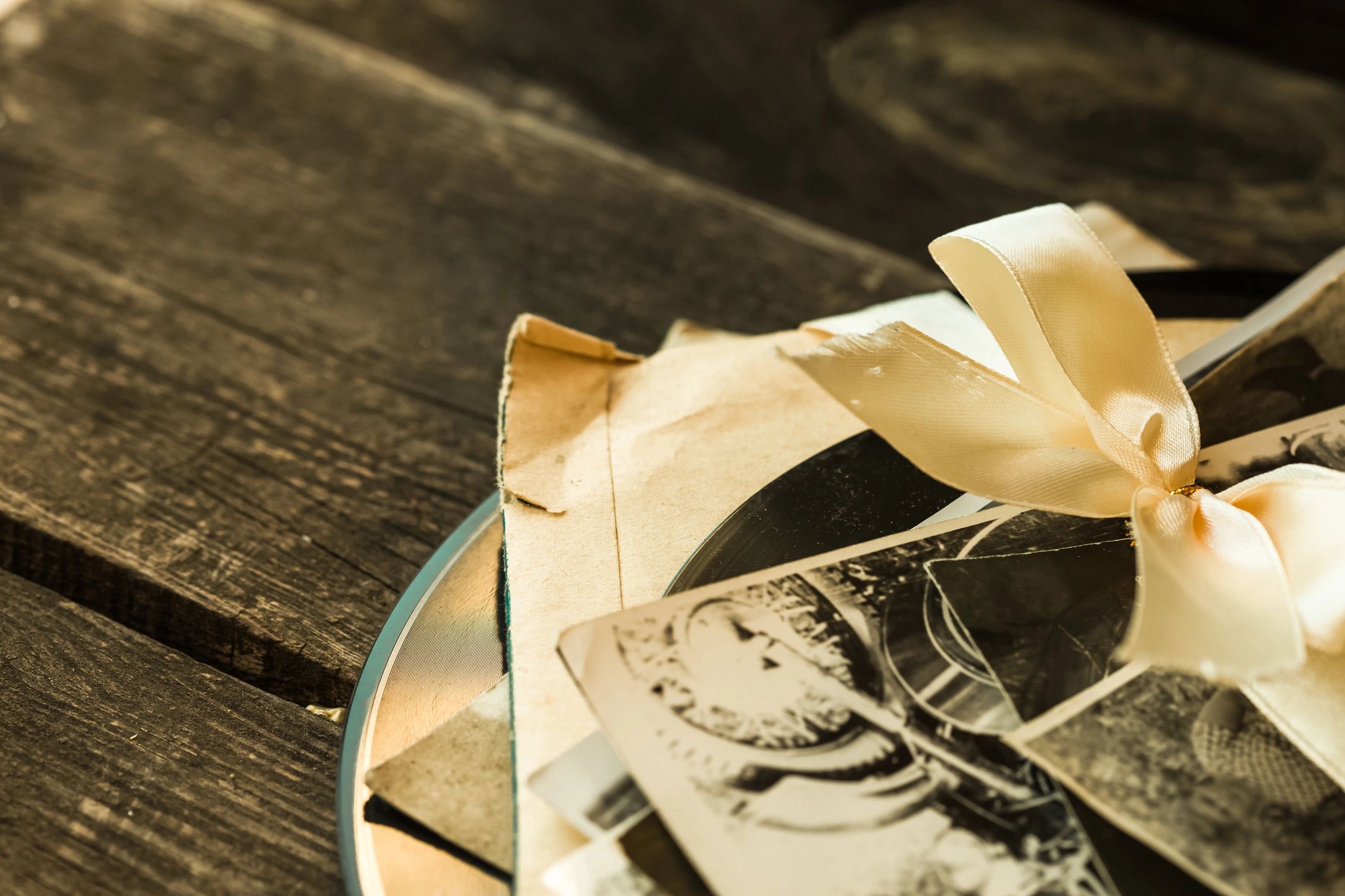Vintage family memory photographs arranged on a surface